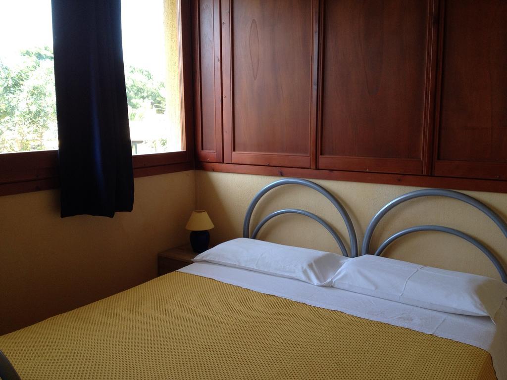 I Lentischi Aparthotel Villasimius Cameră foto